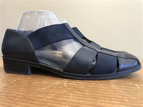 navy blue closed toe sandals.